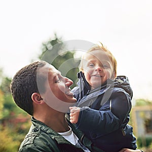 Dad, child and portrait of love in nature with happy smile, support and bonding in outdoor garden. Father, son and