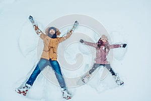 Dad with daughter outdoor in winter