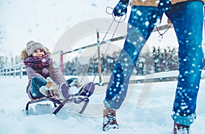 Dad with daughter outdoor in winter