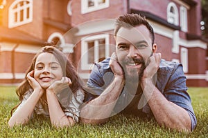 Dad with daughter outdoors