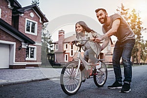 Dad with daughter outdoors photo