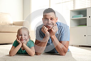 Dad and daughter spending time at home. Happy Father`s Day