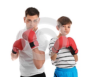 Dad and his son with boxing gloves