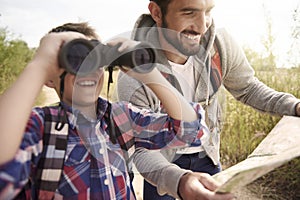 Dad with his son exploring new places photo