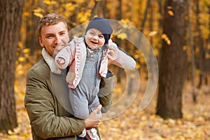 Dad holding baby girl in hands