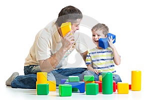 Dad and kid boy role-playing together