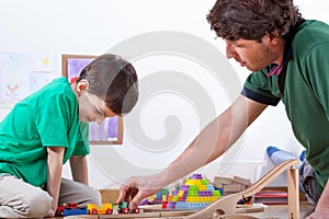 Dad playing with son