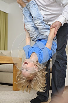 Dad playing with son