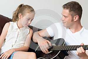 Dad plays the guitar.