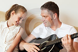 Dad plays the guitar.