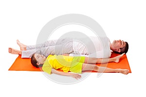 Dad practicing yoga with daughter isolated