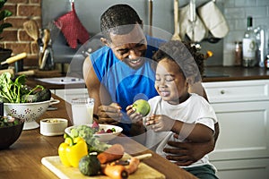 Dad and son cooking together