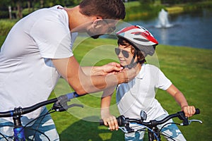 Dad and son cycling