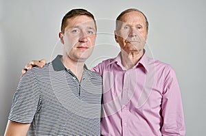 Dad and son on grey background