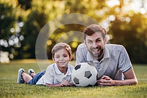 Dad with son playing baseball