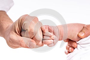 Dad and son`s hands photo