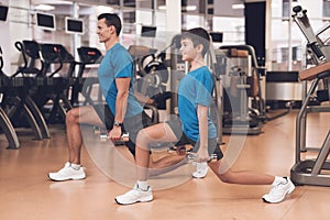 Dad and son in the same clothes in gym. Father and son lead a healthy lifestyle.