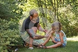 Dad with sticking plaster