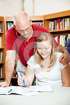 Dad or Teacher Helps Student