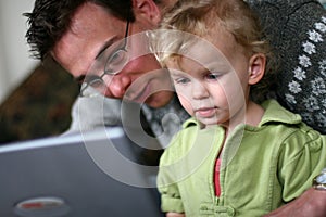 Daddy and Baby at Computer photo