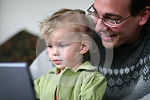 Daddy and Baby at Computer photo