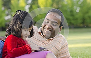 Daddy and daughter is playing