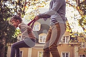 Daddy have play with his little girl.