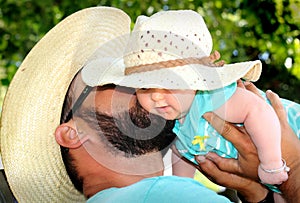 Daddy Kisses Newborn