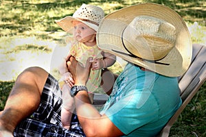 Daddy Looking at Newborn