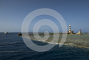 Daedalus Reef and lighthouse in the middle of the Red Sea