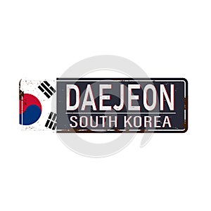 Daejeon rusted metal road sign isolated on white background.