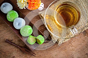 Daifuku green tea and sesame filling with cup of tea