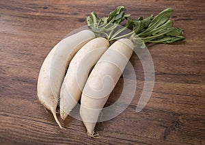 Daikon radish on the wood