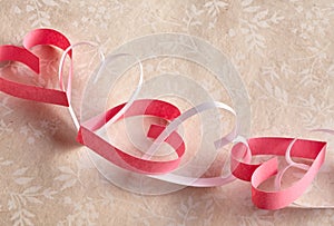 Dainty chain of red and white paper hearts