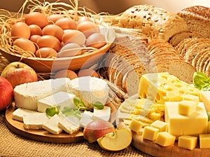 Dairy food, eggs, chees, breads and apples