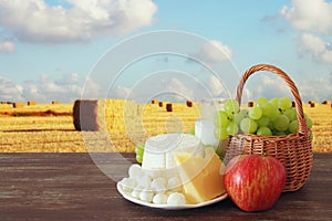 dairy products and fruits. Symbols of jewish holiday - Shavuot