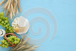 dairy products and fruits. Symbols of jewish holiday - Shavuot