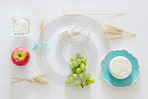 dairy products and fruits. Symbols of jewish holiday - Shavuot