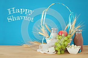 dairy products and fruits. Symbols of jewish holiday - Shavuot