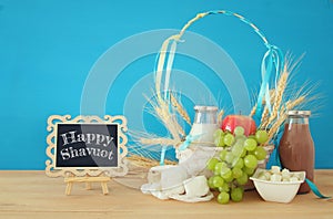 dairy products and fruits. Symbols of jewish holiday - Shavuot