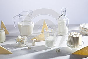 Dairy products in glass recipients on  white background