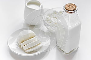 Dairy products for proteic meal on white table background photo