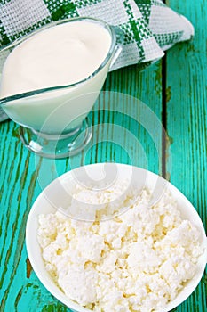 Dairy products on wooden background.