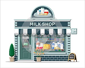 Dairy store or milk shop with signboard, awning. photo