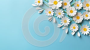 daisies handmade crafted paper spring flowers on blue color background with copy space