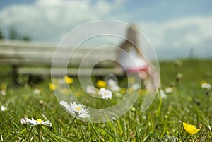 Daisy and a young girl sitting on a bench