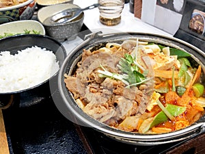 Dakbokkeumtang delicious abalone stew in a hot pot with rice