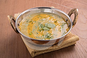 Dal curry on wooden background