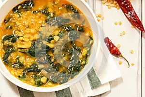 Dal Indian lentil curry soup with spinach