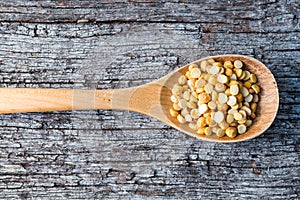 Dal in wooden spoon (cropped)